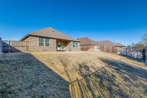 a house view with a outdoor space