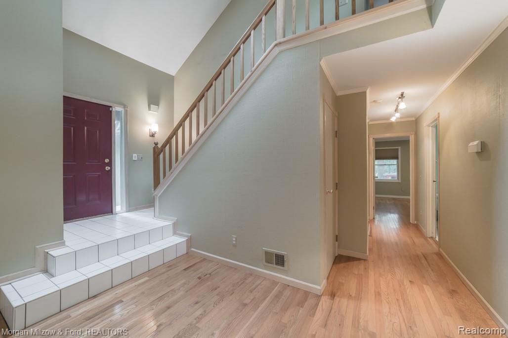 5195 Woodlane Road Clarkston, MI 48348 - Photo 22 of 50 HARDWOOD FLOOR THROUGHOUT MAIN LEVEL