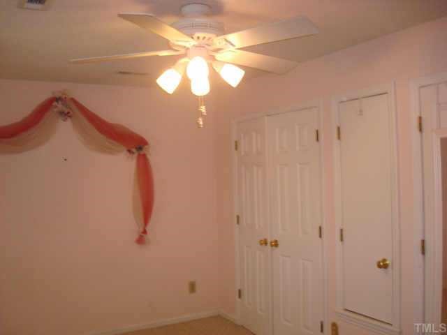 3605 Old Country Lane Raleigh, NC 27616 - Photo 6 of 10 Upstairs bedroom fit for a princess. Double closets w/built in shelves. Additional closet built for toy storage, but perfect for office storage as well.