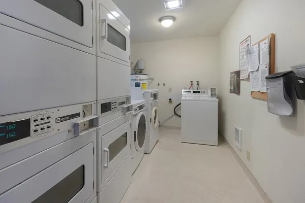 a storage room with washer and dryer