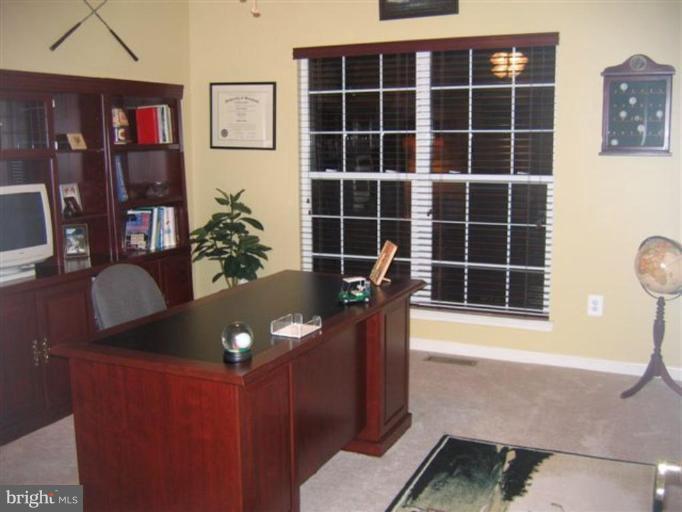14504 Bubbling Spring Road Boyds, MD 20841 - Photo 2 of 21 a view of a living room and dining room