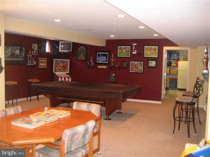 14504 Bubbling Spring Road Boyds, MD 20841 - Photo 12 of 21 a view of a chairs and table in a room