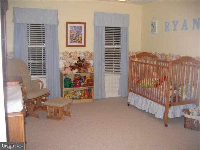 14504 Bubbling Spring Road Boyds, MD 20841 - Photo 9 of 21 a view of livingroom with furniture and floor to ceiling window