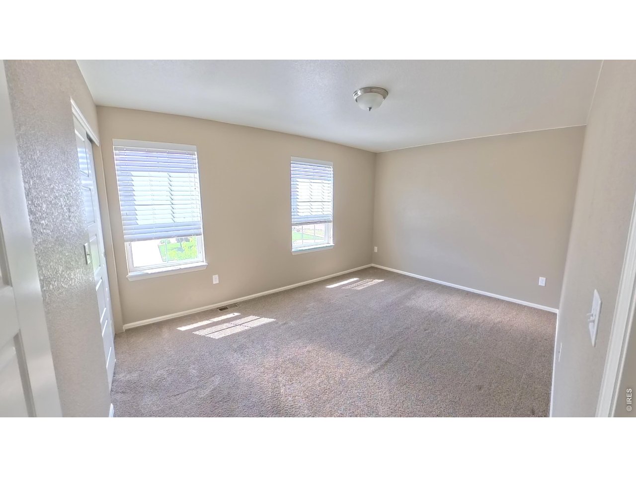 10434 Bluegrass Street Firestone, CO 80504 - Photo 13 of 26 Bedroom 3 with plenty of natural light