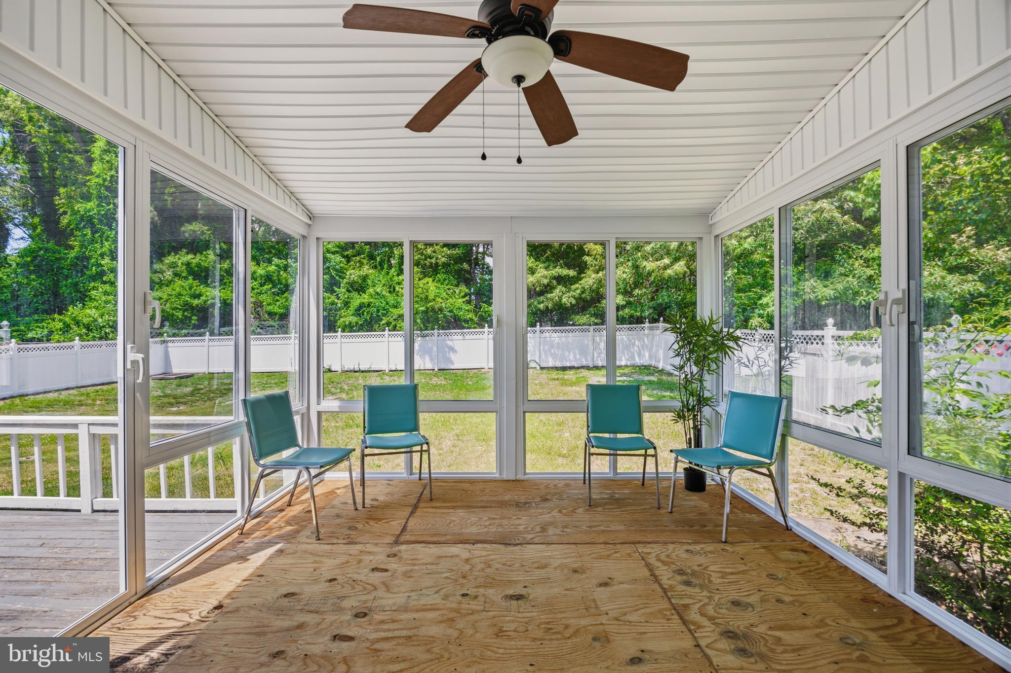 1506 Gollum Road Hanover, MD 21076 - Photo 40 of 44 a view of a patio with a floor to ceiling window and a floor to ceiling window