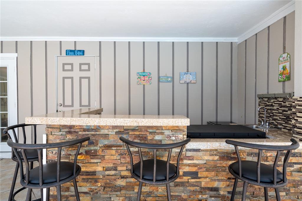 2140 Pinehurst Street Sarasota, FL 34231 - Photo 28 of 40 a view of a dining room with furniture