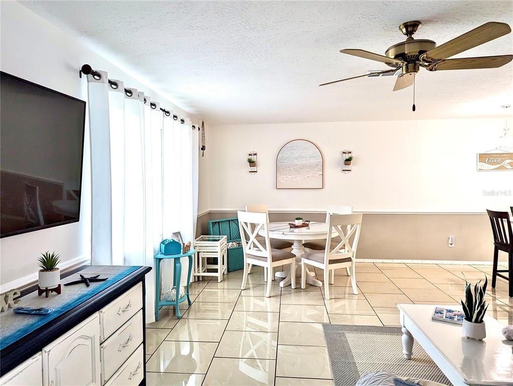 2140 Pinehurst Street Sarasota, FL 34231 - Photo 35 of 40 a view of a dining room with furniture