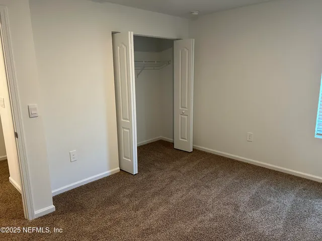 an empty room with closet