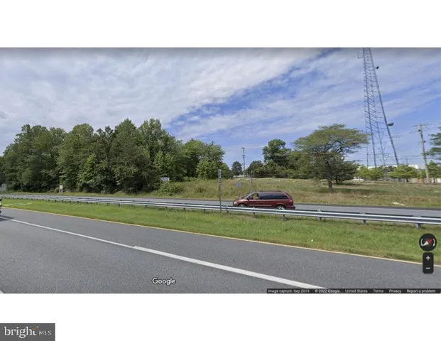 a black and white photo of a field