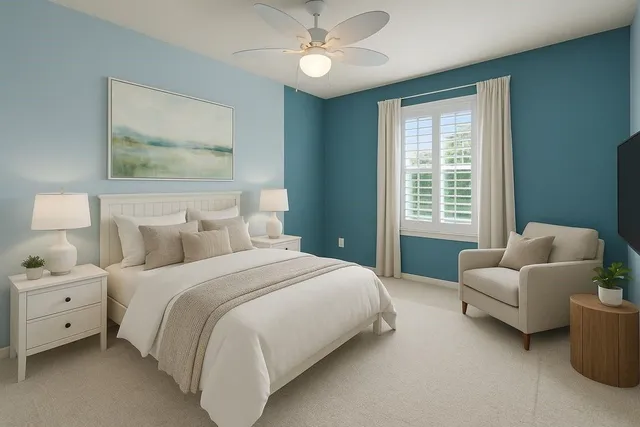 a bedroom with bed couch and window