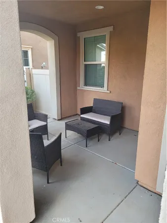 a room with furniture and window