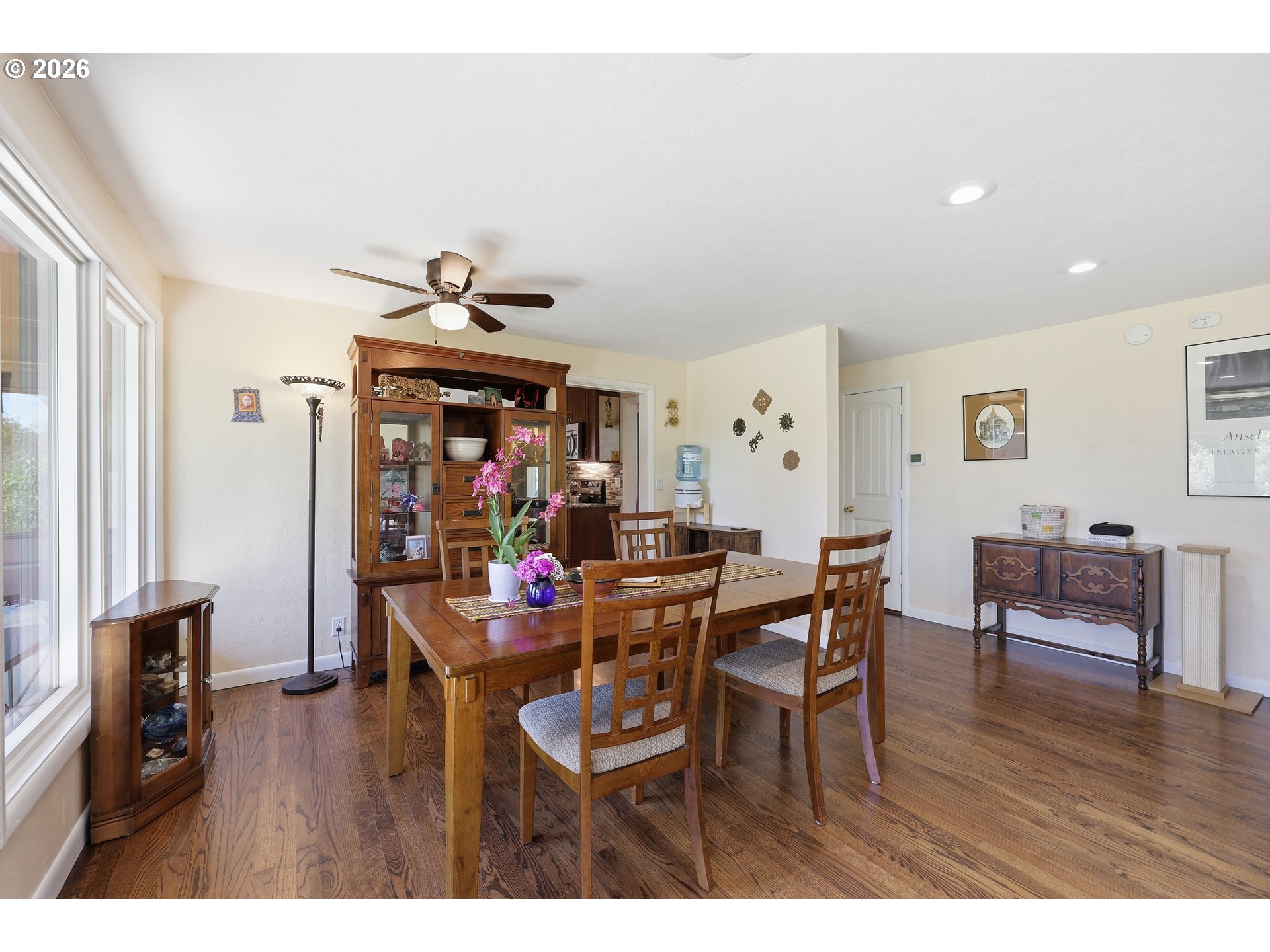 65 Greenvale Drive Springfield, OR 97477 - Photo 9 of 42 a view of a dining room with furniture and wooden floor