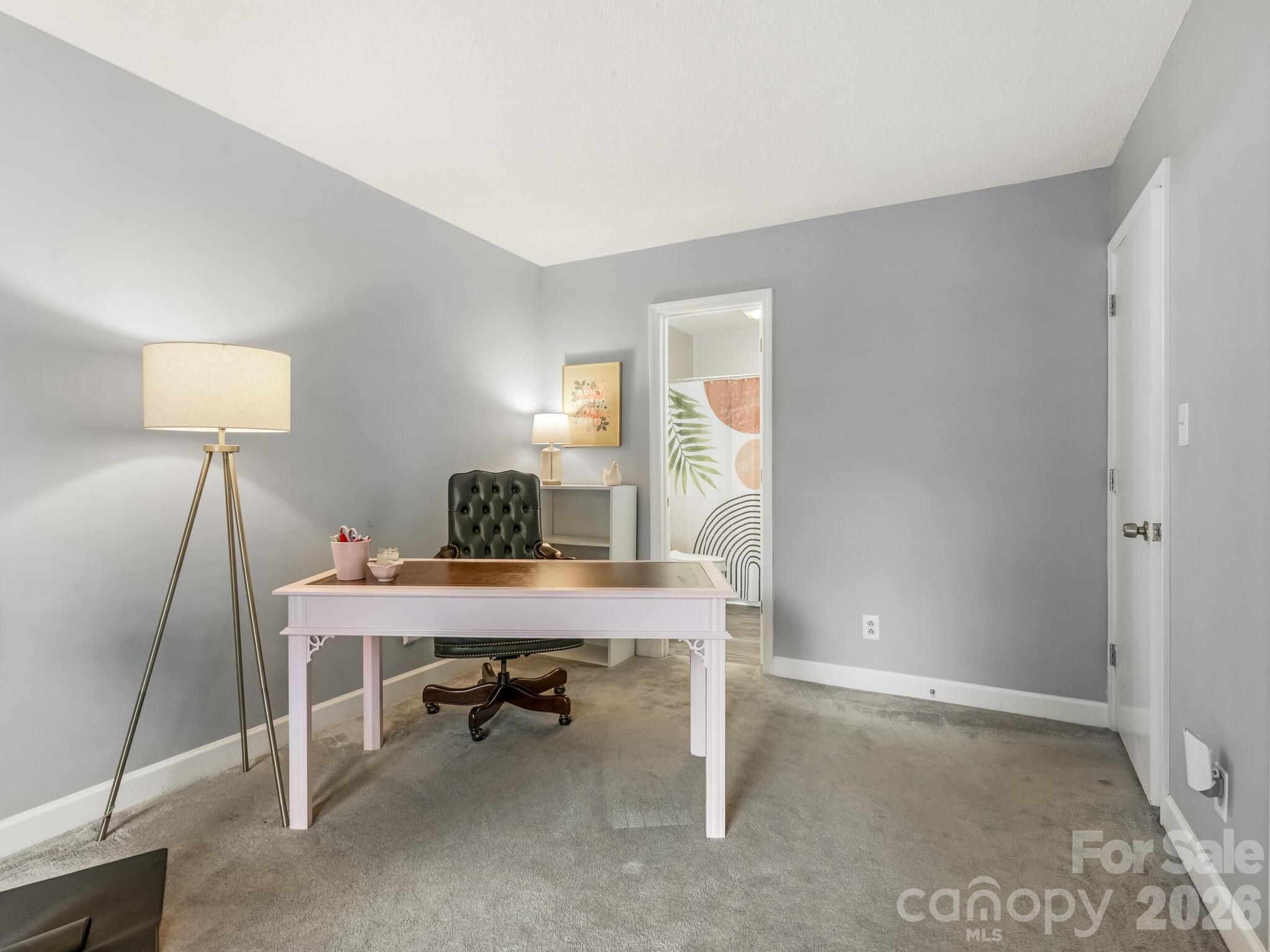 1612 Sharon Road West, Unit 68 Charlotte, NC 28210 - Photo 13 of 18 a view of a workspace with furniture