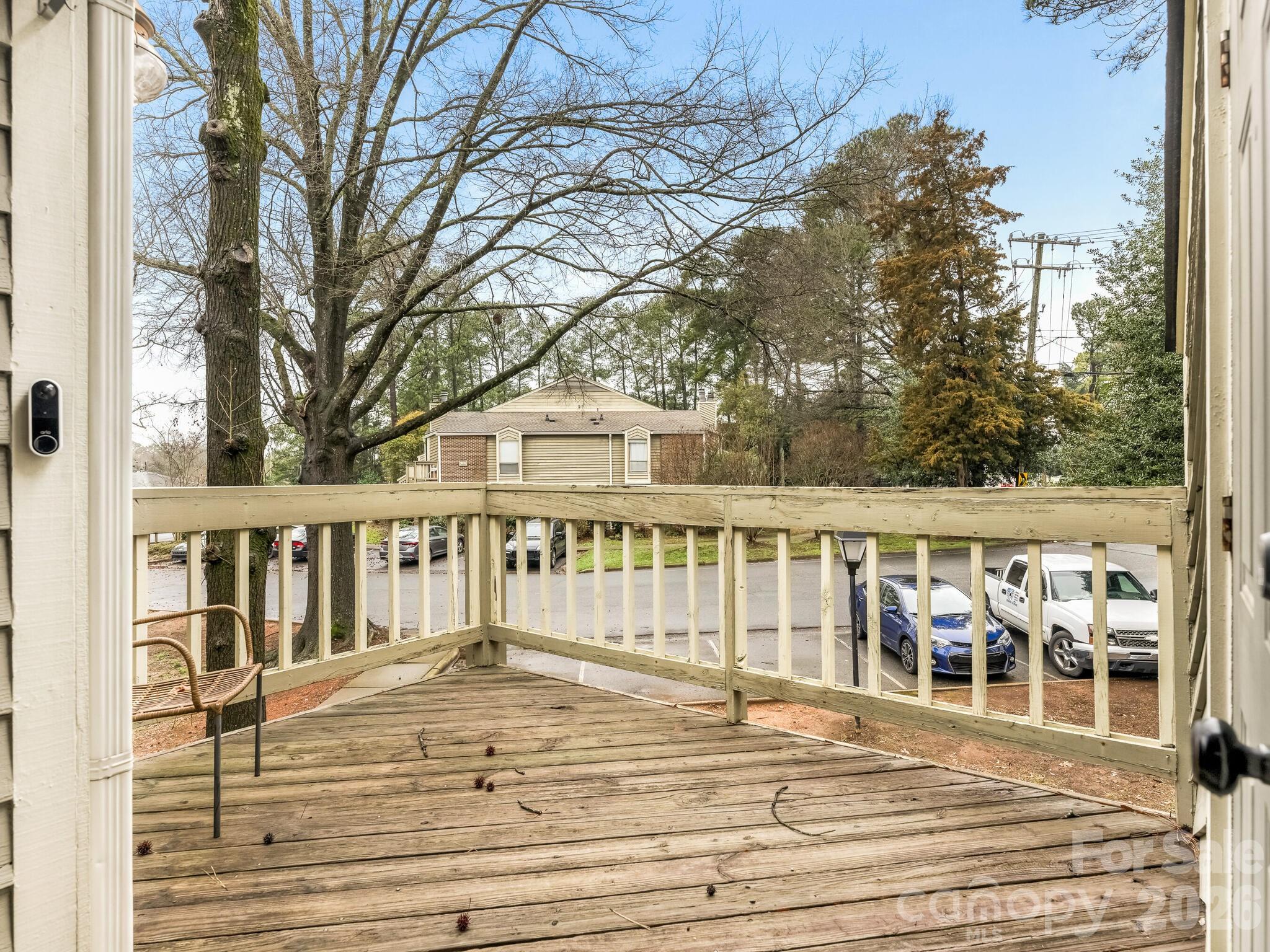 1612 Sharon Road West, Unit 68 Charlotte, NC 28210 - Photo 18 of 18 a view of a house with a wooden stairs