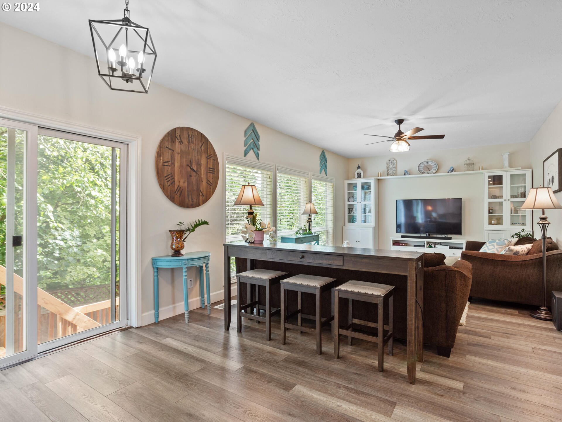 17156 Southeast Macanudo Street Damascus, OR 97089 - Photo 20 of 47 a kitchen with a table and chairs in it