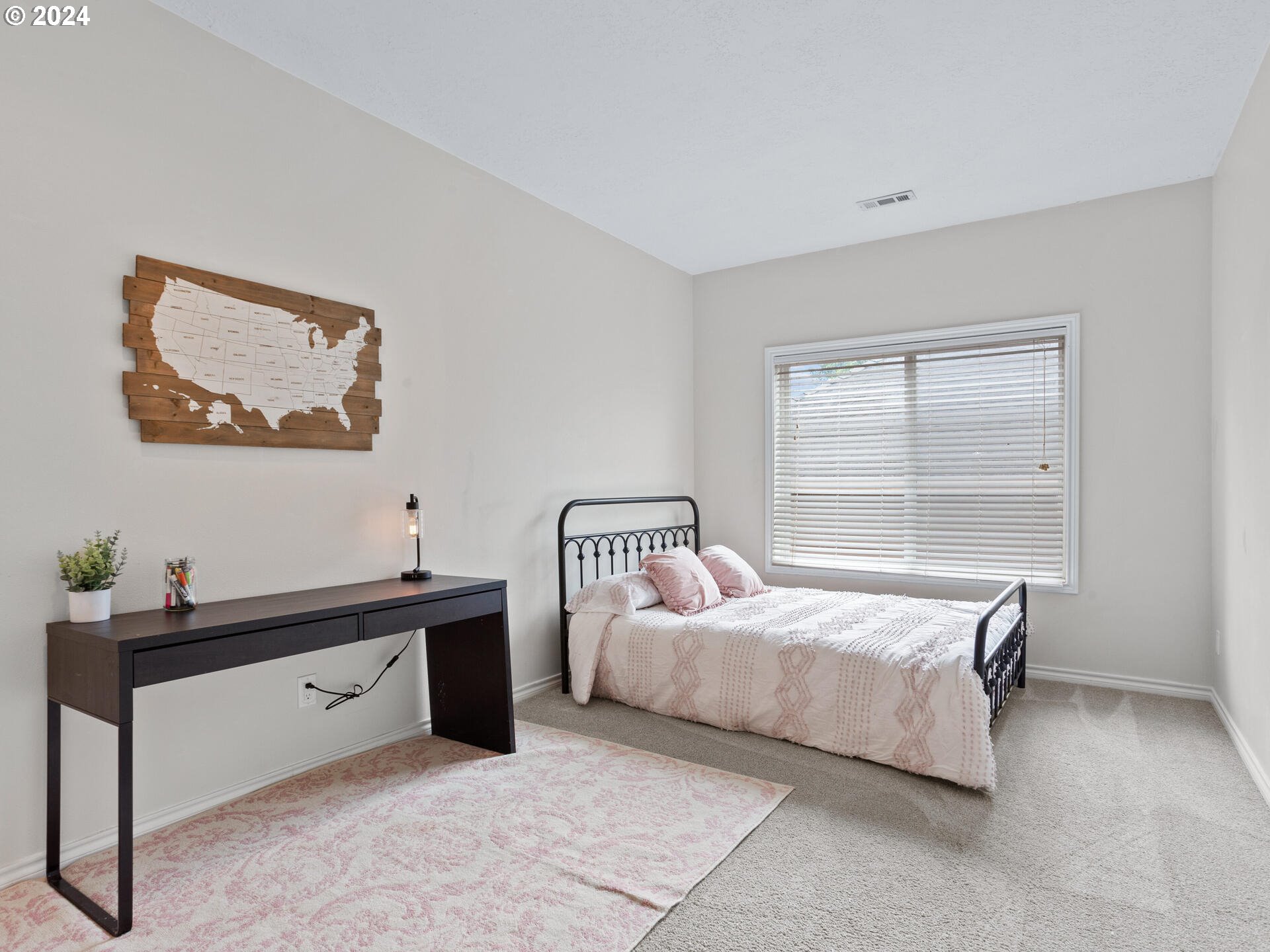 17156 Southeast Macanudo Street Damascus, OR 97089 - Photo 34 of 47 a bedroom with a bed and a window