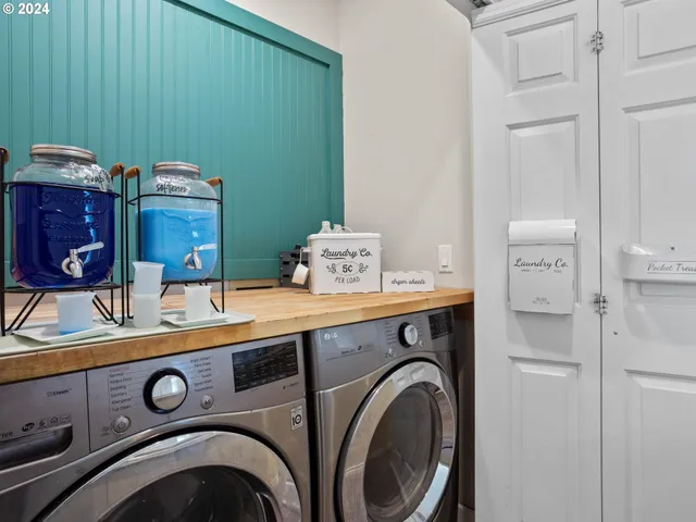 a utility room with dryer and washer