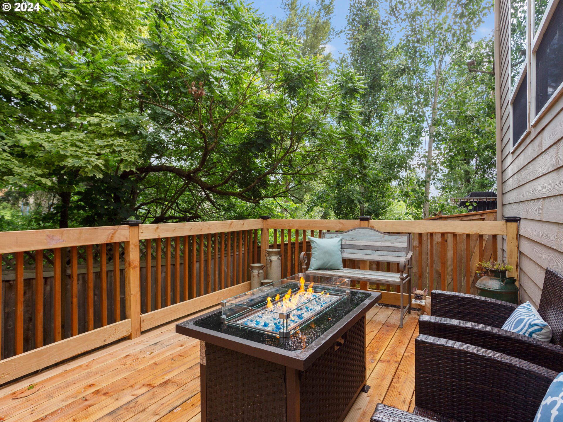 17156 Southeast Macanudo Street Damascus, OR 97089 - Photo 37 of 47 a view of a wooden deck with furniture