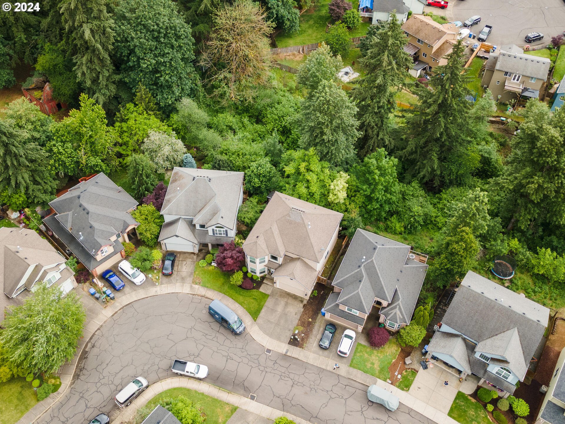 17156 Southeast Macanudo Street Damascus, OR 97089 - Photo 42 of 47 an aerial view of a house with swimming pool and garden