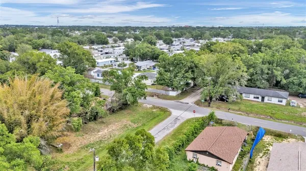 an aerial view of a house with a garden