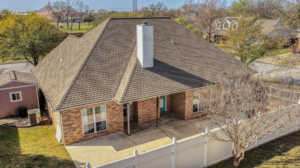 1106 Owl Street Decatur, TX 76234 - Photo 37 of 40 a aerial view of a house with a yard