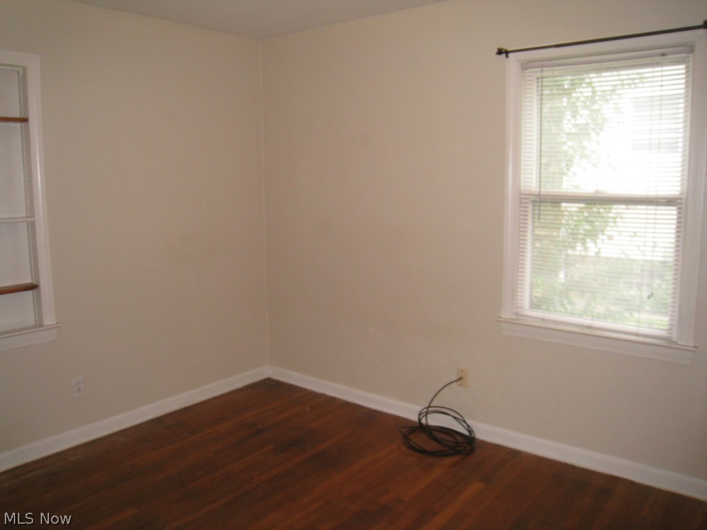 4674 Liberty Road South Euclid, OH 44121 - Photo 11 of 18 2 Bedrooms on the first floor have beautiful hardwood floors.