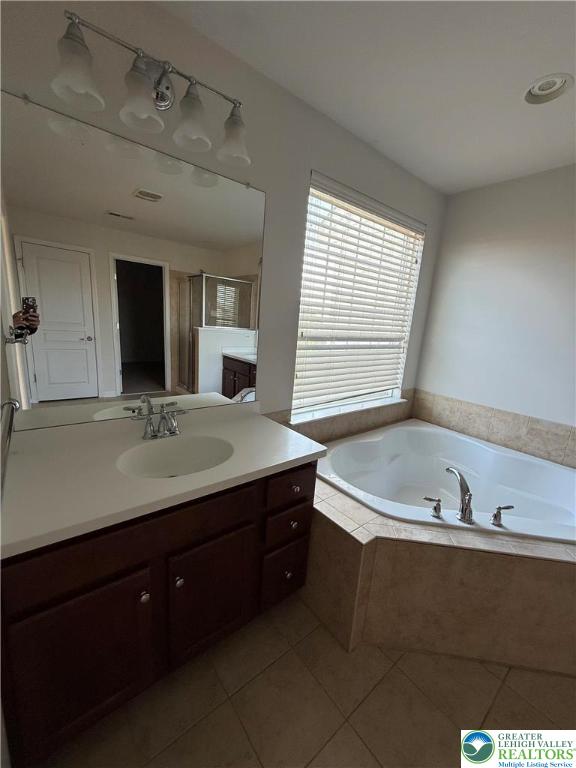 1805 Hemming Way Orefield, PA 18069 - Photo 8 of 24 a bathroom with a tub sink and mirror