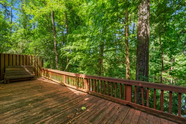 a view of balcony with yard