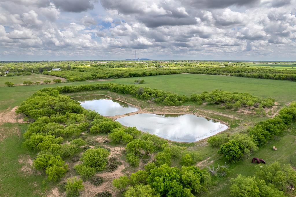 Tbd Memory Lake Road Coleman, TX 76834 - Photo 13 of 38 a view of a lake with a yard