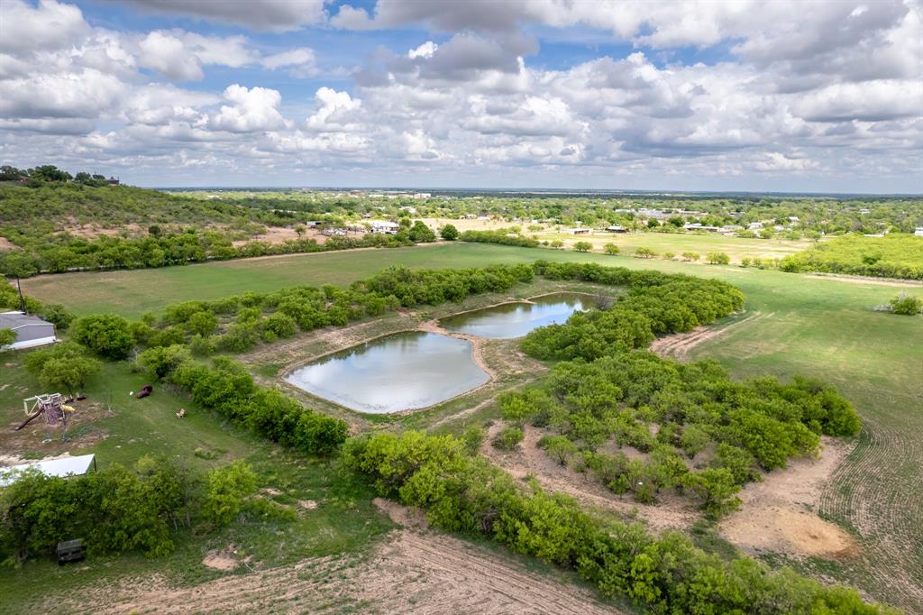 Tbd Memory Lake Road Coleman, TX 76834 - Photo 26 of 38 a view of a lake with a yard