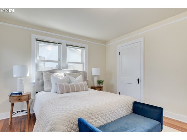 647 5th Street Springfield, OR 97477 - Photo 15 of 40 a bedroom with a bed and a night stand