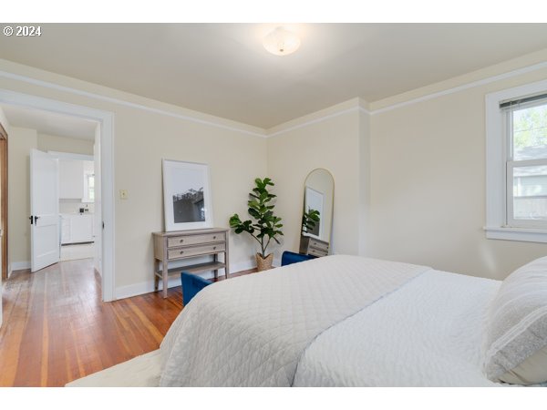 647 5th Street Springfield, OR 97477 - Photo 16 of 40 a bedroom with a bed and a dresser