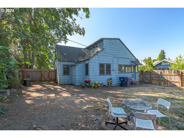 647 5th Street Springfield, OR 97477 - Photo 34 of 40 a view of a house with backyard and sitting area