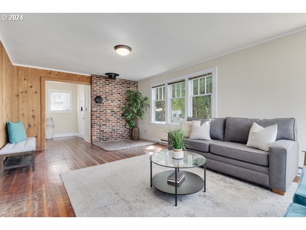 647 5th Street Springfield, OR 97477 - Photo 4 of 40 a living room with furniture and wooden floor