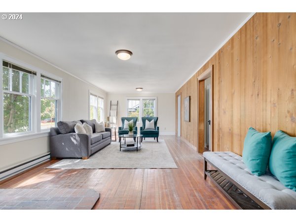 647 5th Street Springfield, OR 97477 - Photo 6 of 40 a living room with furniture and a large window