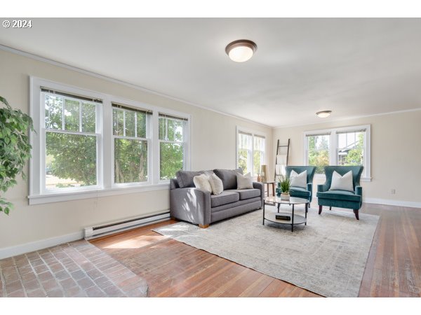 647 5th Street Springfield, OR 97477 - Photo 8 of 40 a living room with furniture and a window