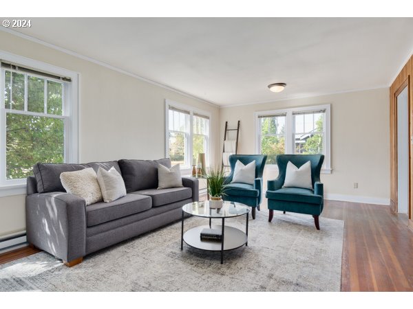 647 5th Street Springfield, OR 97477 - Photo 9 of 40 a living room with furniture and a large window