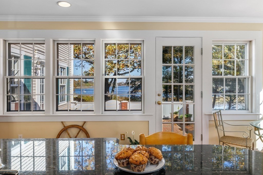 513 Stage Harbor Road Chatham, MA 02633 - Photo 20 of 42 a living room with furniture and a window