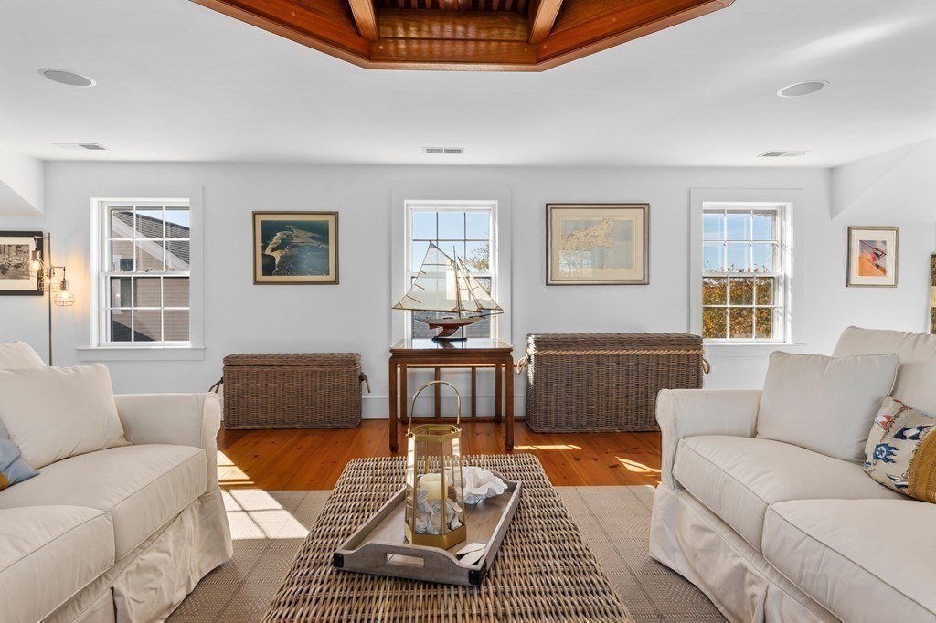513 Stage Harbor Road Chatham, MA 02633 - Photo 24 of 42 a living room with furniture and a window