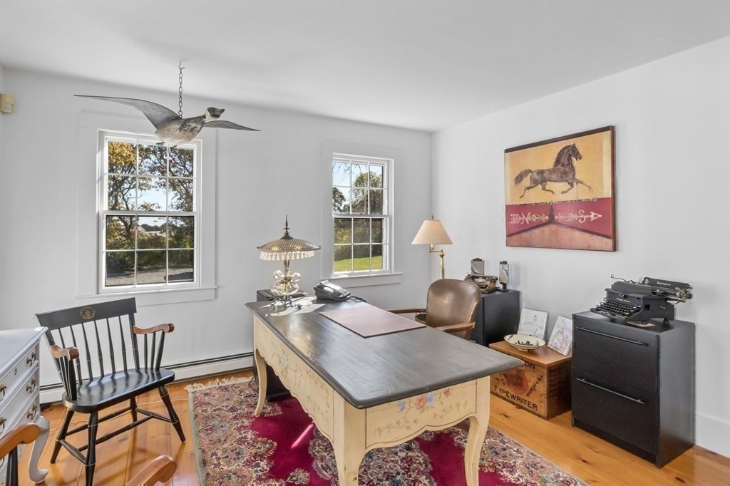 513 Stage Harbor Road Chatham, MA 02633 - Photo 36 of 42 a living room with furniture and a window