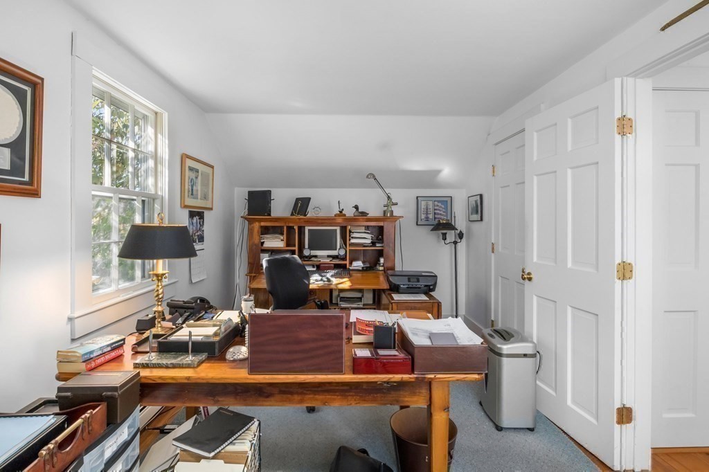 513 Stage Harbor Road Chatham, MA 02633 - Photo 40 of 42 a room with furniture and a window