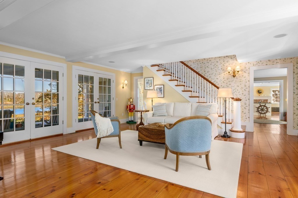 513 Stage Harbor Road Chatham, MA 02633 - Photo 8 of 42 a living room with furniture and a wooden floor