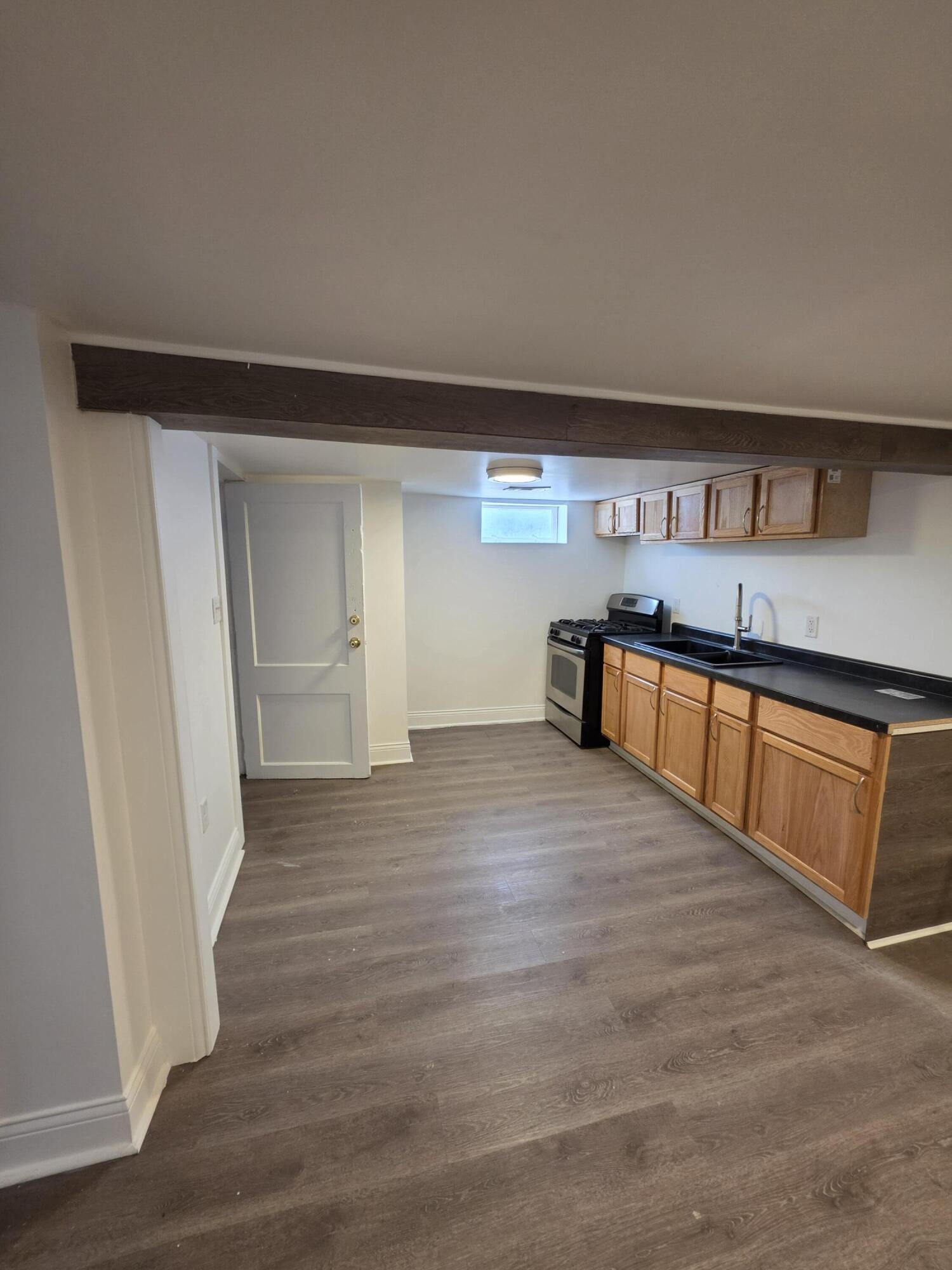 4149 Broadway Gary, IN 46409 - Photo 18 of 26 a view of a kitchen with a sink and a dishwasher