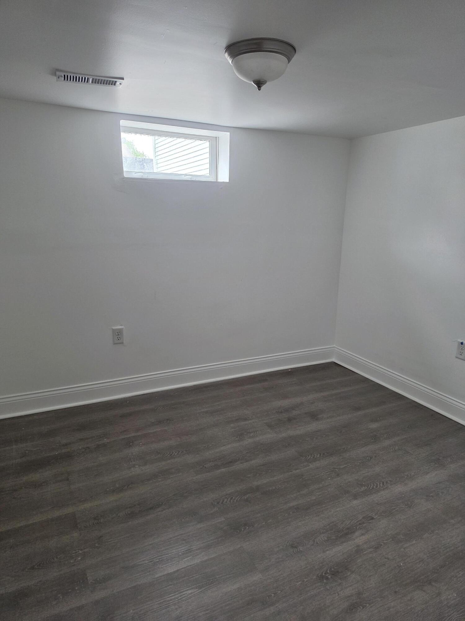 4149 Broadway Gary, IN 46409 - Photo 20 of 26 wooden floor in an empty room