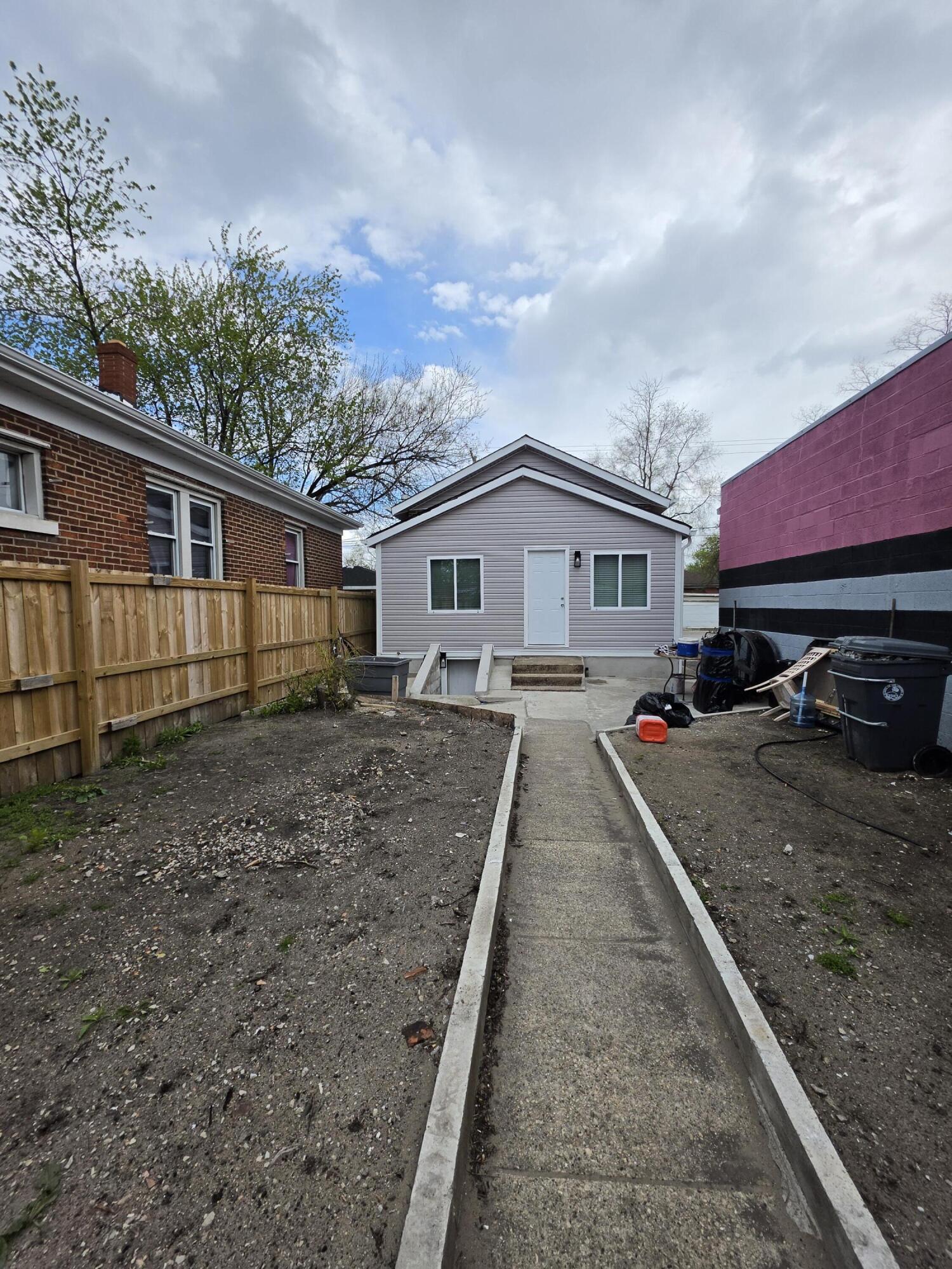 4149 Broadway Gary, IN 46409 - Photo 3 of 26 a front view of a house with yard