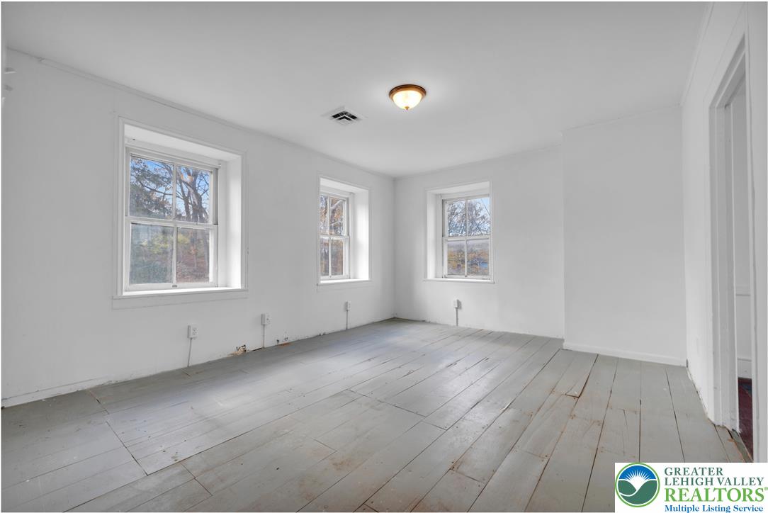 4828 Huckleberry Road Orefield, PA 18069 - Photo 27 of 41 an empty room with windows