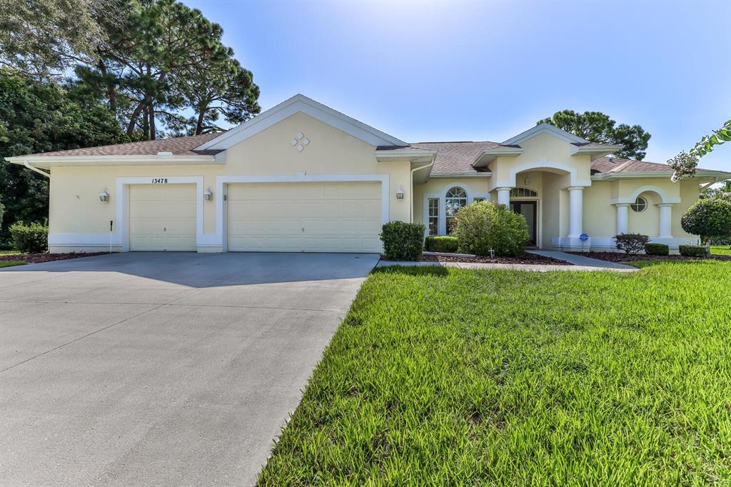 13478 Rudi Loop Spring Hill, FL 34609 - Photo 1 of 1 3/2/2 POOL Home with Bonus Room on 1/2 Acre in Beautiful Plantation Estates