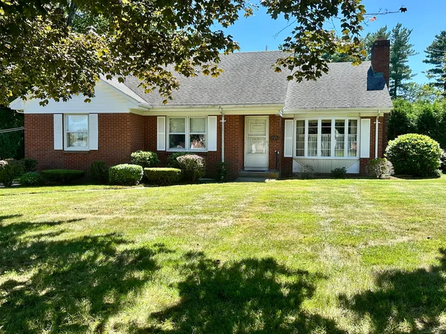 a view of a house with a swimming pool