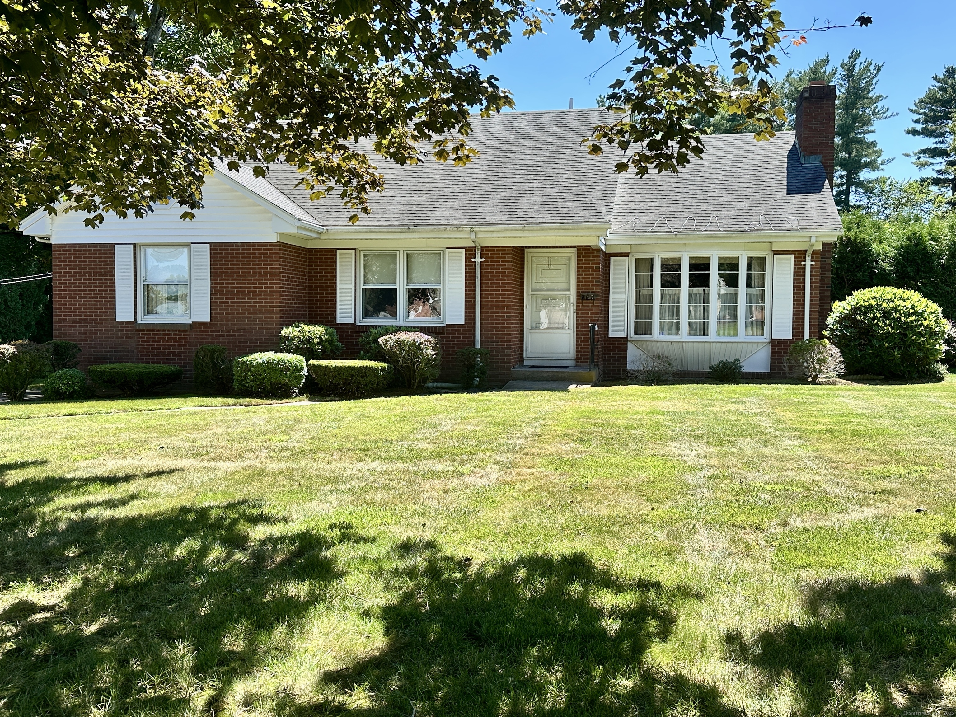 a view of a house with a swimming pool