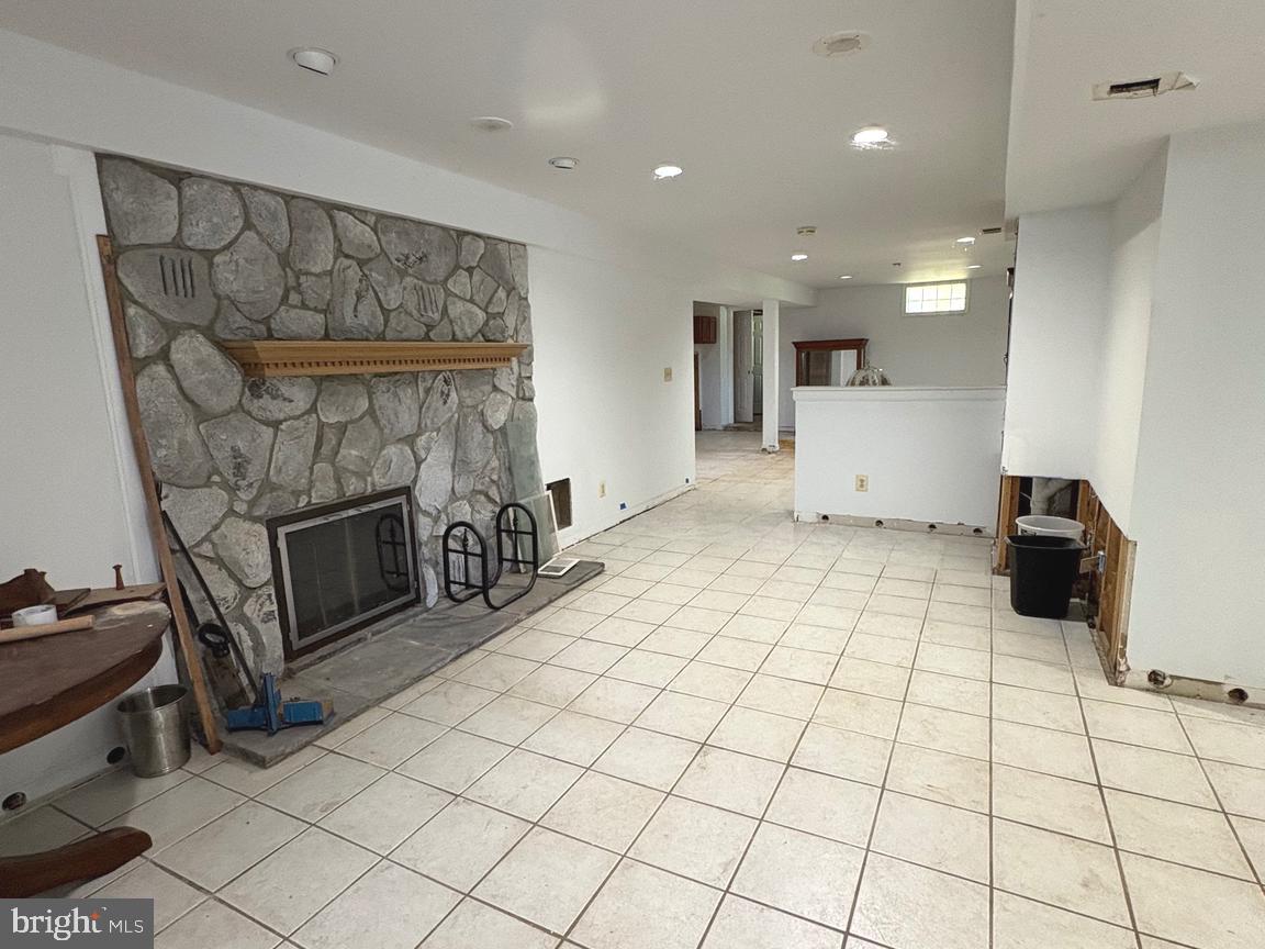 4215 Buffalo Road Mount Airy, MD 21771 - Photo 24 of 44 a view of a livingroom with a fireplace